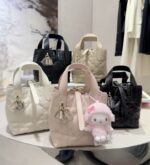 D Toujours Vertical Miniature Bag (حقيبة ديور توجور الرأسية الصغيرة)