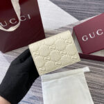 Emblem Mini Wallet (محفظة  إمبلم" الصغيرة)